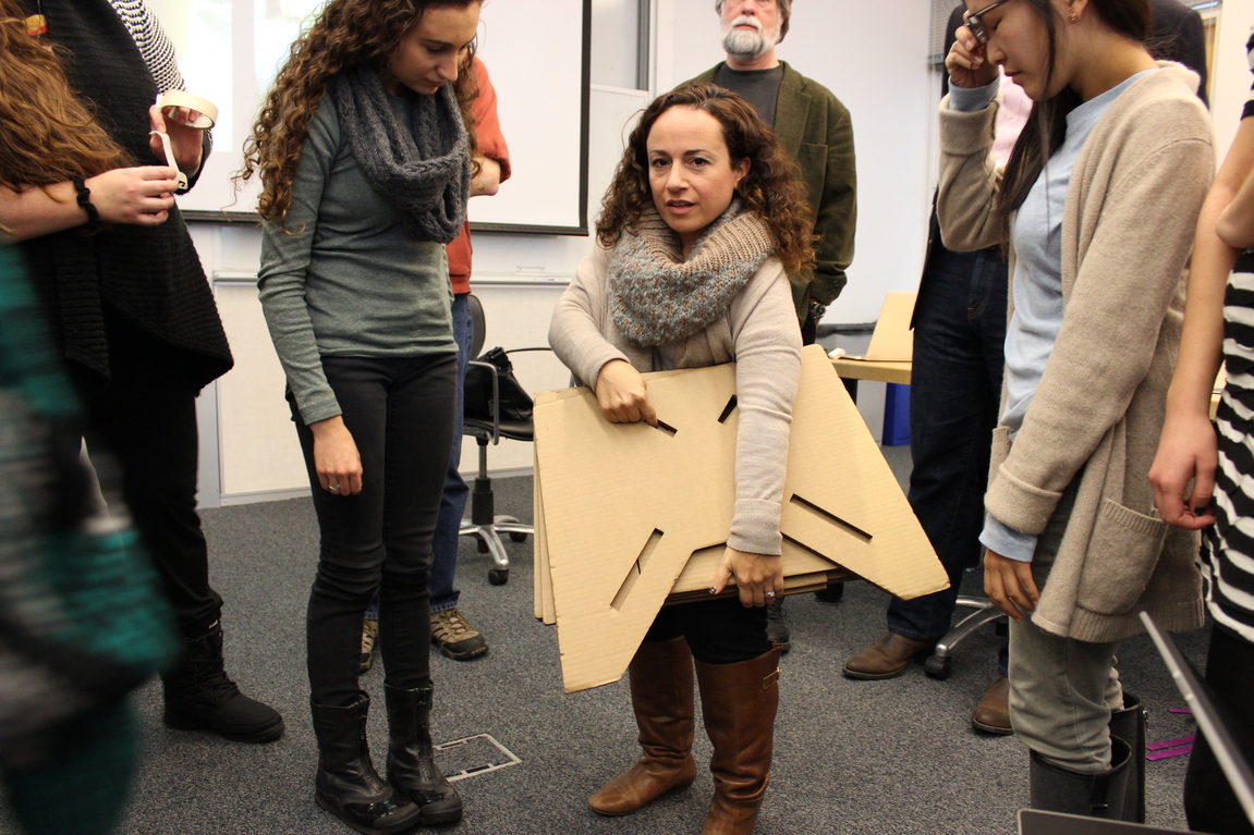 Amanda visits the class, cardboard model in hand.